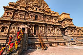 The main temple, in front an open pavilion shelters a huge monolithic Nandi. Pilgrims visiting the temple. 